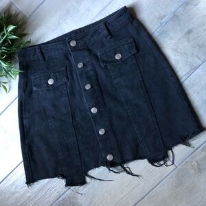 Etophe studios “switch up” black denim button down skirt. Size M